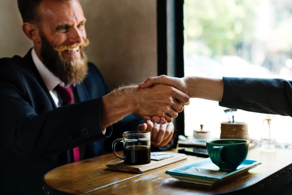 Handshake over Coffee